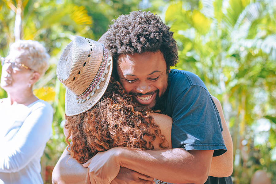 Participants hugging at Soul Medicine in Nayarit, Mexico.